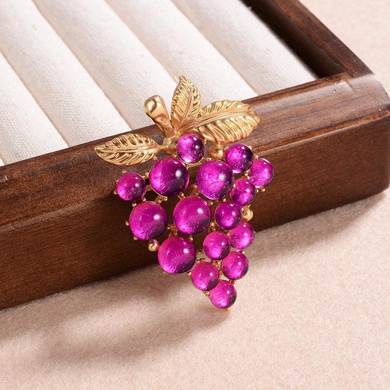 Jeweled Harvest: Multicolored Grape Brooch Collection